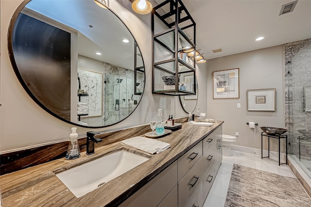 505 Bastrop St Unit 508, Houston, TX 77003 - full bath featuring a marble finish shower, double vanity, toilet, and recessed lighting