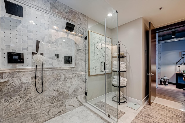505 Bastrop St Unit 508, Houston, TX 77003 - full bath with a shower stall and baseboards