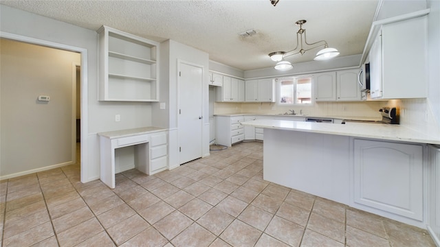 kitchen featuring open shelves, white cabinets, range, a peninsula, and pendant lighting