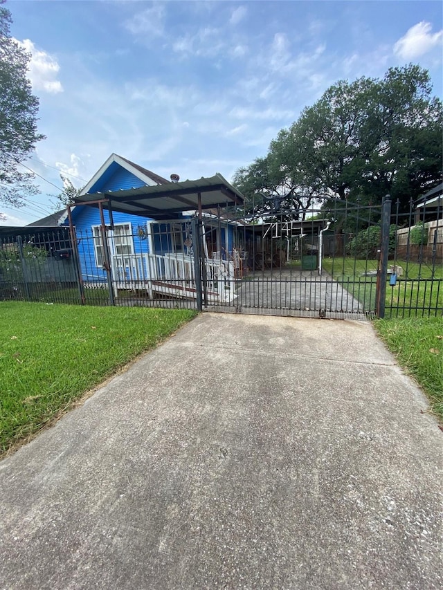 manufactured / mobile home with fence and a gate