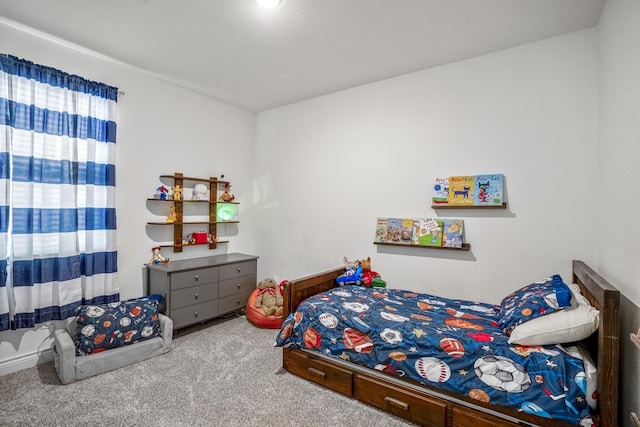 bedroom featuring carpet flooring