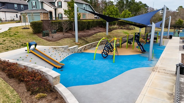 view of pool with a playground