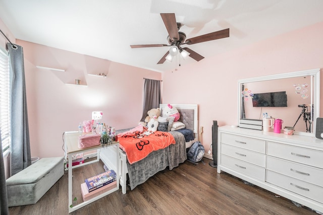 bedroom featuring dark wood-style floors, multiple windows, and ceiling fan