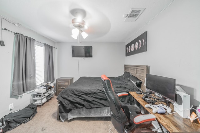 bedroom featuring ceiling fan, carpet floors, and visible vents