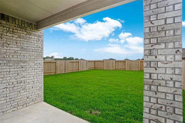 view of yard featuring a fenced backyard