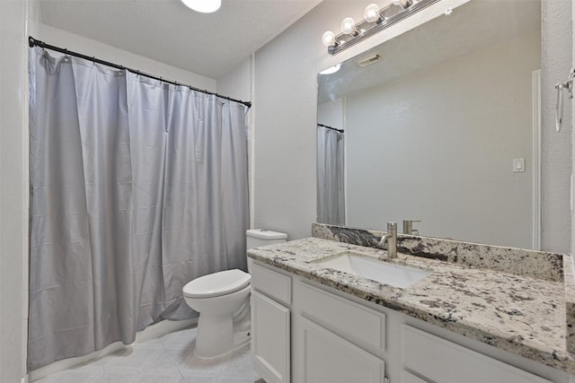 bathroom featuring visible vents, toilet, a shower with curtain, tile patterned floors, and vanity