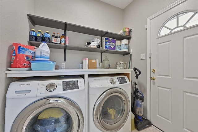 clothes washing area with laundry area and independent washer and dryer