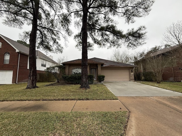 view of front of home with a front yard, concrete driveway, brick siding, and an attached garage