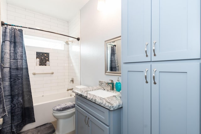 bathroom with a closet, toilet, shower / bathtub combination with curtain, and vanity