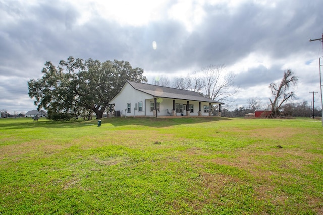 view of yard featuring a porch