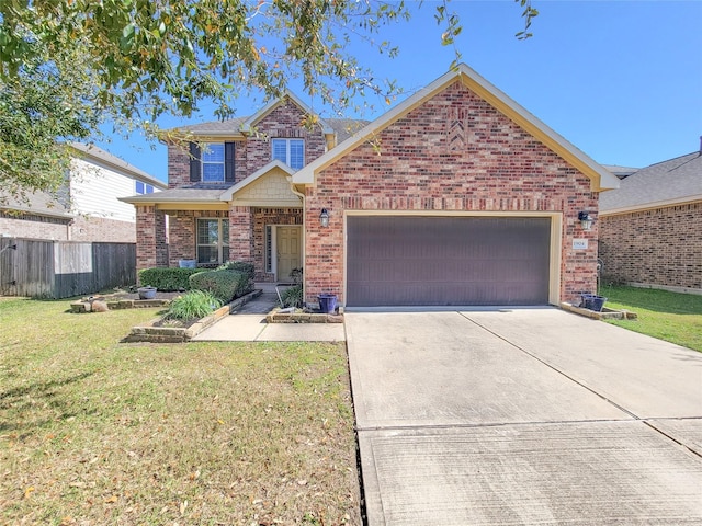 view of front facade with fence, an attached garage, concrete driveway, a front lawn, and brick siding