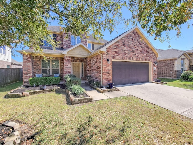 1904 Emerald Breeze Ct, Pearland, TX 77089 - traditional home with a front yard, fence, brick siding, an attached garage, and concrete driveway