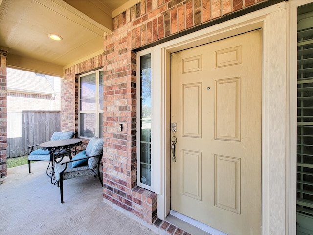 1904 Emerald Breeze Ct, Pearland, TX 77089 - property entrance with brick siding and covered porch