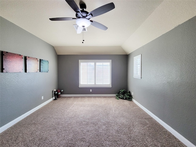 1904 Emerald Breeze Ct, Pearland, TX 77089 - carpeted empty room featuring a textured wall, a ceiling fan, and lofted ceiling