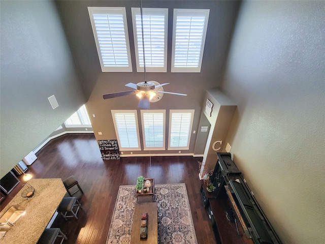 1904 Emerald Breeze Ct, Pearland, TX 77089 - living room with a towering ceiling, a ceiling fan, and wood finished floors