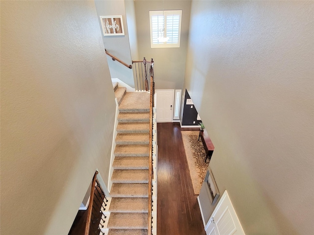1904 Emerald Breeze Ct, Pearland, TX 77089 - stairway with a high ceiling and wood finished floors