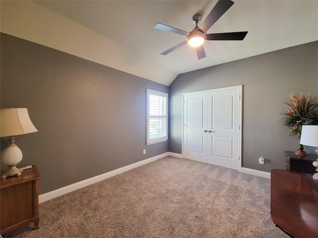 1904 Emerald Breeze Ct, Pearland, TX 77089 - carpeted bedroom featuring a closet, baseboards, vaulted ceiling, and a ceiling fan