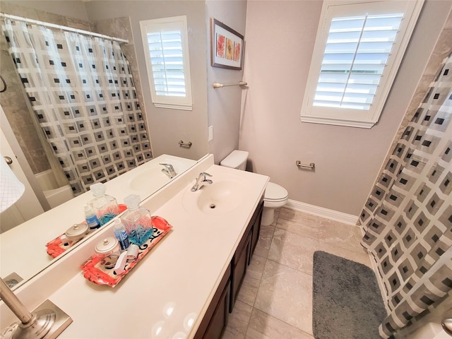1904 Emerald Breeze Ct, Pearland, TX 77089 - bathroom with toilet, vanity, baseboards, and tile patterned flooring