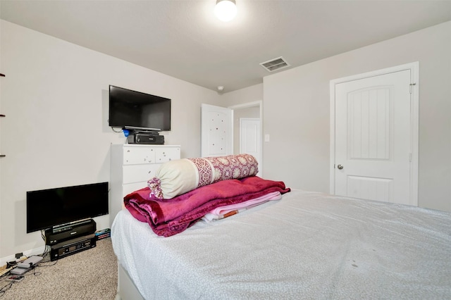 bedroom with carpet flooring and visible vents