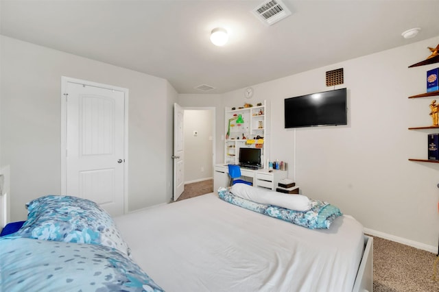 bedroom featuring carpet, visible vents, and baseboards