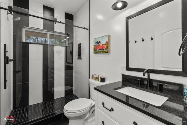 6270 US Highway 259 N, Naples, TX 75568 - full bath featuring a shower stall, vanity, and toilet