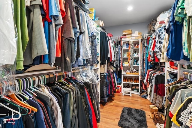 6270 US Highway 259 N, Naples, TX 75568 - walk in closet featuring wood finished floors