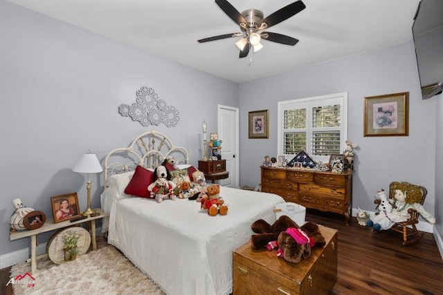 6270 US Highway 259 N, Naples, TX 75568 - bedroom with baseboards, dark wood finished floors, and a ceiling fan