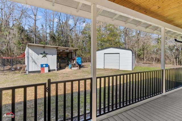 6270 US Highway 259 N, Naples, TX 75568 - wooden deck featuring a yard, a shed, and an outdoor structure