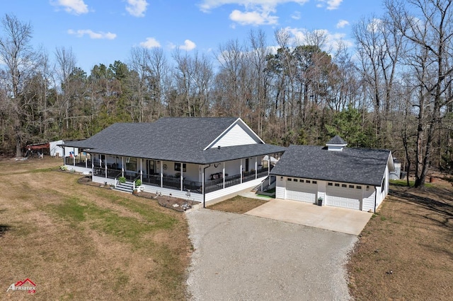 6270 US Highway 259 N, Naples, TX 75568 - farmhouse with a garage, driveway, roof with shingles, a porch, and a front yard