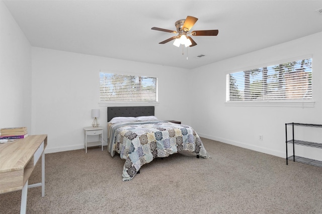 8014 Northbridge Cir, Spring, TX 77379 - bedroom with multiple windows, baseboards, and carpet flooring