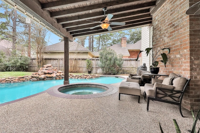 8014 Northbridge Cir, Spring, TX 77379 - view of swimming pool featuring an in-ground hot tub, a fenced backyard, and ceiling fan