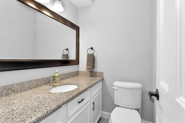8014 Northbridge Cir, Spring, TX 77379 - bathroom featuring vanity, toilet, and baseboards