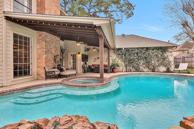 8014 Northbridge Cir, Spring, TX 77379 - view of swimming pool featuring a ceiling fan, an outdoor living space, a patio area, fence, and a pool with connected hot tub