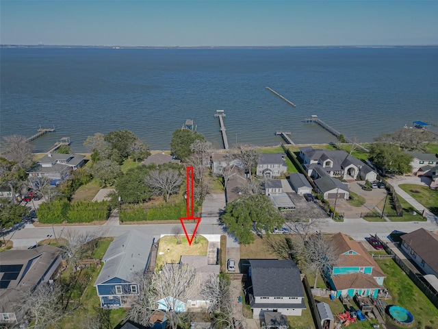 aerial view with a residential view and a water view