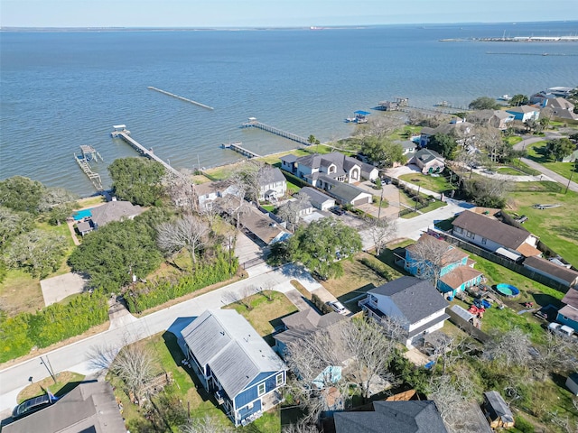 aerial view with a residential view and a water view