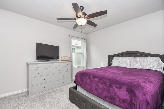 915 Acorn Trail Pl, Tomball, TX 77375 - bedroom featuring carpet floors, baseboards, and ceiling fan