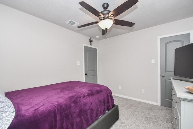 915 Acorn Trail Pl, Tomball, TX 77375 - bedroom featuring light carpet, baseboards, and a ceiling fan