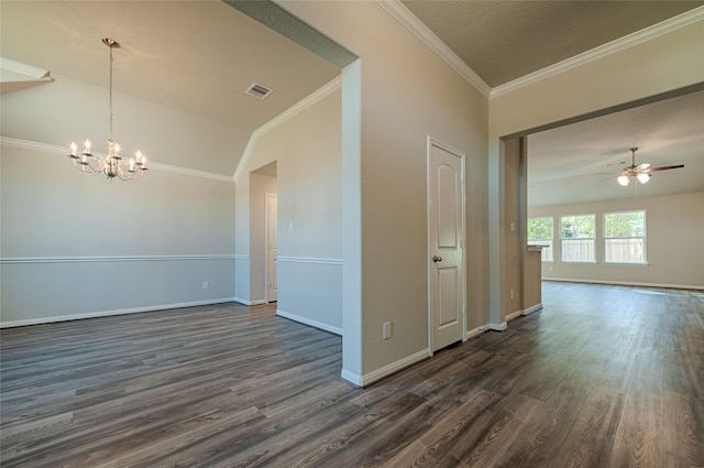 spare room with dark wood finished floors, lofted ceiling, visible vents, ornamental molding, and baseboards