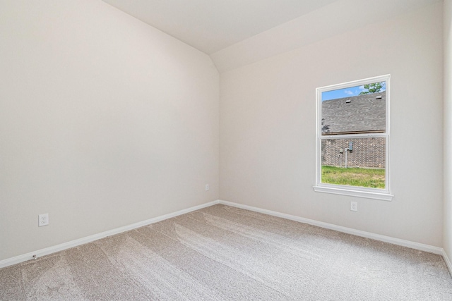 1414 Rd 66113, Dayton, TX 77535 - carpeted empty room featuring baseboards and lofted ceiling