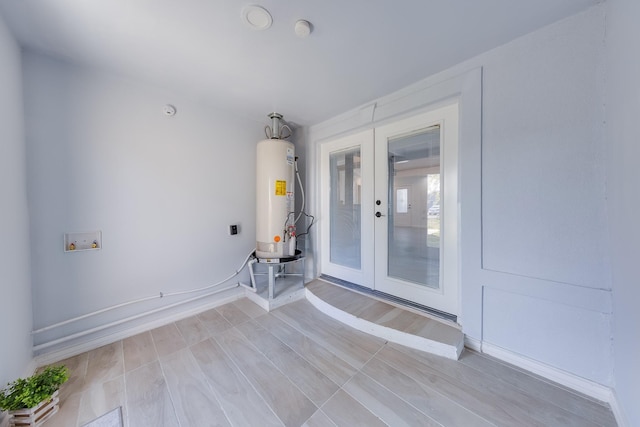 interior space featuring gas water heater and french doors