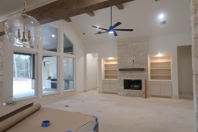 unfurnished living room featuring built in shelves, high vaulted ceiling, and beamed ceiling