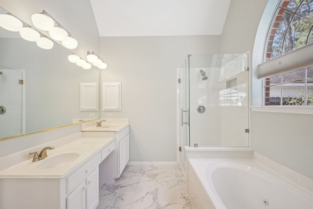 full bath featuring double vanity, a whirlpool tub, a stall shower, marble finish floor, and a sink