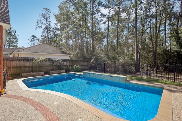 view of pool featuring a fenced in pool and a fenced backyard