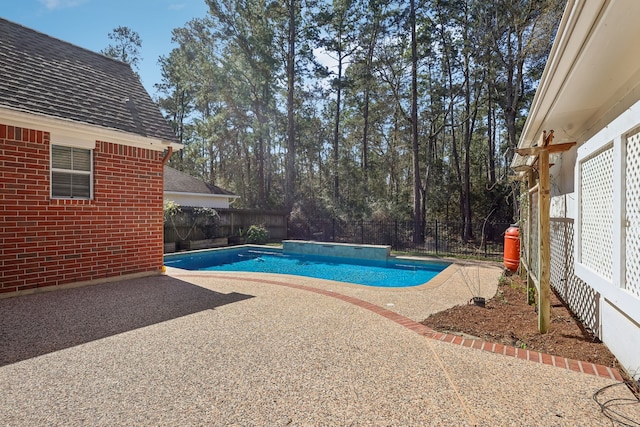 view of pool with a patio, a fenced backyard, and a fenced in pool