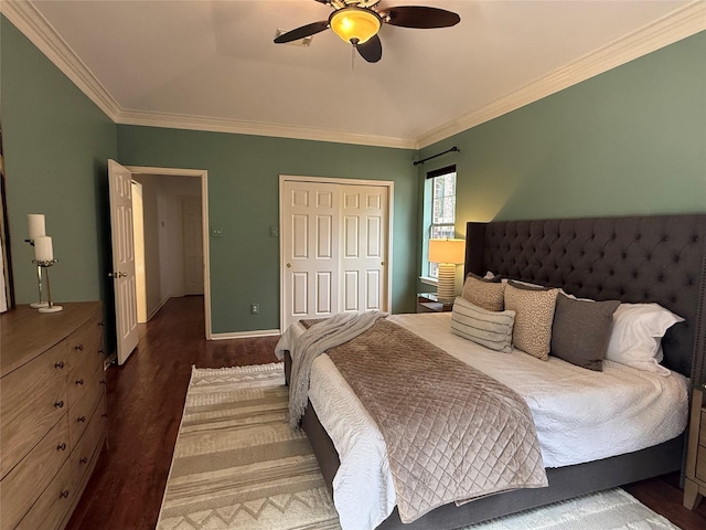 19 Shady Pond Pl, The Woodlands, TX 77382 - bedroom featuring wood finished floors, crown molding, a closet, a ceiling fan, and baseboards