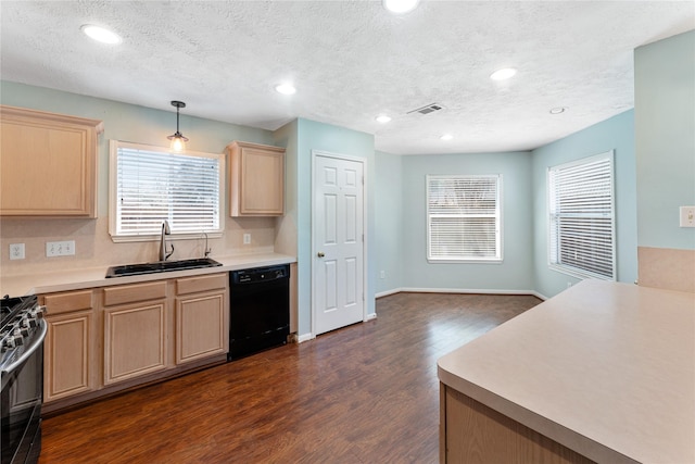 kitchen featuring light brown cabinets, a sink, black dishwasher, gas range, and dark wood-style flooring