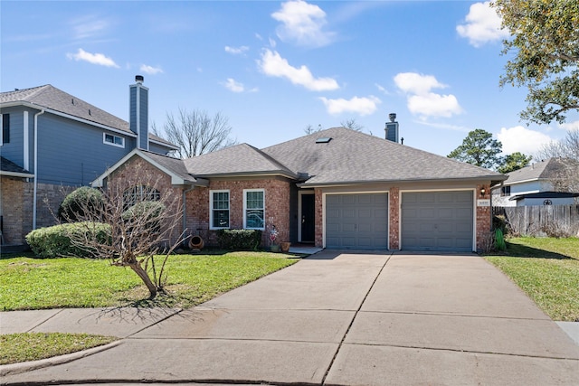 view of front of house with brick siding, concrete driveway, a front lawn, and fence