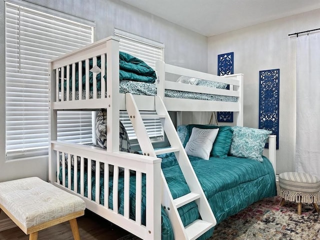 bedroom featuring wood finished floors