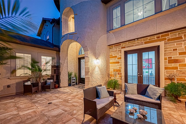 view of patio featuring french doors and outdoor lounge area