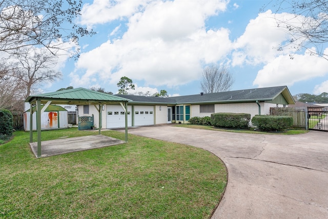 ranch-style home featuring brick siding, an attached garage, a front yard, fence, and driveway